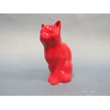A RED GLAZED CAT MARKED TO THE BASE ROYAL DOULTON SAMPLE