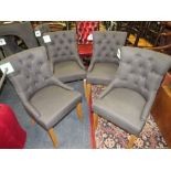 A SET OF FOUR MODERN UPHOLSTERED DINING CHAIRS