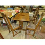 AN OAK OLD CHARM REFECTORY TABLE WITH FOUR CHAIRS EACH CHAIR WITH CARVED DEDICATION TO 'HRH PRINCE
