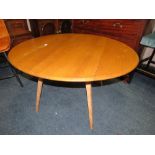 AN ERCOL DROPLEAF TABLE