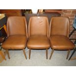 THREE MODERN BROWN LEATHER STYLE CHAIRS