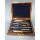 A VINTAGE MAHOGANY CASED TECHNICAL DRAWING SET