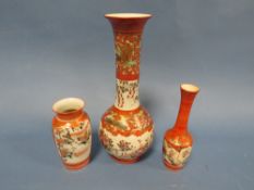 A JAPANESE RED SATSUMA VASE WITH TWO SMALLER VASES (3)