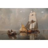 A PAIR OF GILT FRAMED AND GLAZED CONTINENTAL WATERCOLOURS OF BOATS ON THE SEA - H 34.5 CM W 54.5 CM