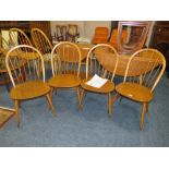 A SET OF FOUR ERCOL WINDSOR CHAIRS