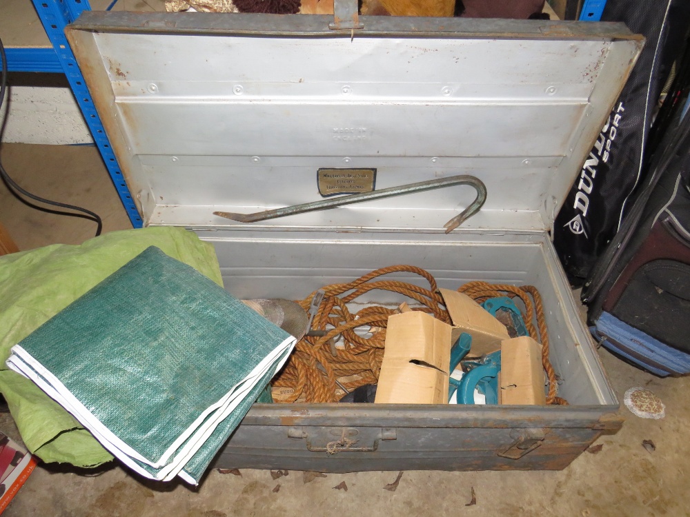 A LARGE STEEL FRAMED TRAVELLING TRUNK WITH ROPE, CROWBAR ETC