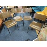 A SET OF FOUR INDUSTRIAL STYLE STACKING DINING CHAIRS