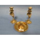 A PAIR OF EASTERN BRASS PEACOCK CANDLESTICKS TOGETHER WITH A FOX HEAD CIRCULAR DISH