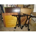 A SELECTION OF THICK WOODEN AND WORK TOPS TOGETHER WITH A CAST IRON PUB TABLE FRAME