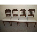 FOUR UPHOLSTERED ANTIQUE OAK DINING CHAIRS