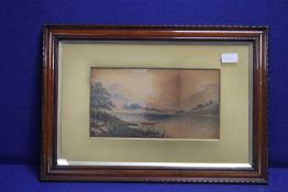 AN ARTHUR MCARTUR WATERCOLOUR OF A LAKE SCENE SIGNED TO THE LOWER RIGHT 54 CM X 37 CM