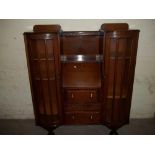 AN OAK LADIES WRITING BUREAU FLANKED BY 2 BOOKCASES