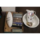 A TRAY OF BOOKS AND A JUG AND BOWL SET (TRAY NOT INCLUDED)