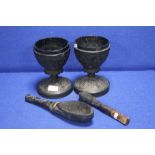 TWO CARVED GOBLETS TOGETHER WITH 2 CARVED SPOONS