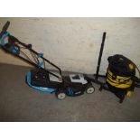 A MACALISTER ELECTRIC MOWER TOGETHER WITH AN INDUSTRIAL VACUUM