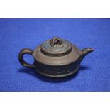 AN ORIENTAL TYPE TEAPOT