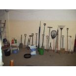 A LARGE SELECTION OF GARDEN TOOLS TO INCLUDE A FISHING ROD