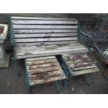 A CAST IRON AND WOOD GARDEN BENCH AND 2 TABLES