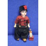 A SMALL ANTIQUE BISQUE HEADED DOLL TOGETHER WITH A SMALL WOODEN FIGURE A/F