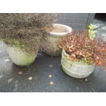 THREE LARGE RECONSTITUTED STONE GARDEN PLANTERS