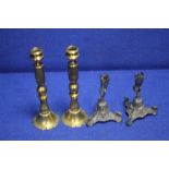 TWO PAIRS OF VINTAGE METAL CANDLESTICKS TOGETHER WITH A PAIR OF EPRERGNE BASES