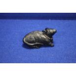 AN ANTIQUE JAPANESE CARVED HARDWOOD OKIMINO OF A RAT WITH CHARACTER MARKS TO THE UNDER SIDE 9.5 CM