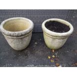 A PAIR OF RECONSTITUTED STONE LARGE GARDEN PLANTERS,br.