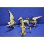 TWO BRASS BIRDS ALONG WITH A DOG AND A PLANE