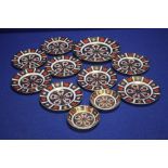 A QUANTITY OF ROYAL CROWN DERBY IMARI PATTERN PLATES AND PIN DISHES,br.