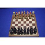 A PAINTED CHESS SET