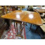 AN EDWARDIAN MAHOGANY SUTHERLAND TABLE