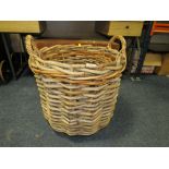 A LARGE WICKER LOG BASKET H-53 CM