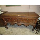 A 19TH CENTURY TWO DRAWER DRESSER OF SMALL PROPORTIONS W-142 CM