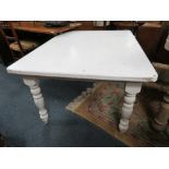 A MODERN PAINTED PINE LOW KITCHEN TABLE H-65 W-120 CM