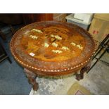 A 20TH CENTURY CIRCULAR EASTERN HARDWOOD TABLE WITH INLAID BONE AND MARQUETRY DETAIL, RAISED ON FOUR