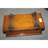 A VINTAGE WOODEN TIE PRESS WITH STORAGE COMPARTMENTS