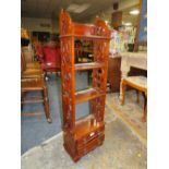 A REPRODUCTION MAHOGANY SMALL BOOKCASE