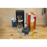 A BOXED OLD TUPTON WARE MINIATURE VASE TOGETHER WITH A BOXED ROYAL DOULTON HAND CUT CRYSTAL VASE AND