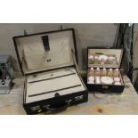 A SMALL VINTAGE SUITCASE TOGETHER WITH A CASE SET OF ELIZABETH ARDEN COSMETICS ETC (2)