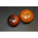 TWO LARGE AMBER TYPE BEADS