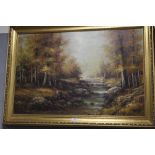 A GILT FRAMED OIL ON CANVAS OF A WOODED STREAM SIGNED MIKE LOWER LEFT