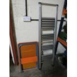 A MODERN SET OF ALLOY STEPS AND AN ORANGE TROLLEY (2)