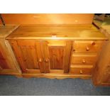 A MODERN PINE MEDIA/STORAGE CABINET W-106 CM