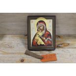 A RELIGIOUS ICON ON WOODEN PANEL TOGETHER WITH A PIECE OF WOOD WITH TAG 'A BIT OF THE OLD