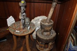 A COLLECTION OF AFRICAN TRIBAL TYPE ITEMS TO INCLUDE A PESTLE AND MORTAR, TWO STOOLS ETC