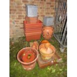 A QUANTITY OF TERRACOTTA AND PLASTIC GARDEN PLANTERS
