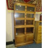 A VINTAGE OAK 'MINTY' FIVE STAGE BOOKCASE (IN ONE) H-178 W-89 CM