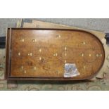 A VINTAGE BOXED CORINTHIAN WOODEN BAGATELLE GAME WITH BALLS