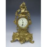 A CAST BRASS ROCOCO TIME PIECE IN THE LOUIS XV STYLE, the enamel dial with steel spade hands and