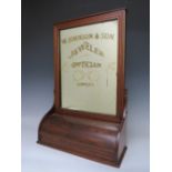 A LATE 19TH / EARLY 20TH CENTURY TABLE TOP ADVERTISING MIRROR, with drawer at base, 'W. Johnson &